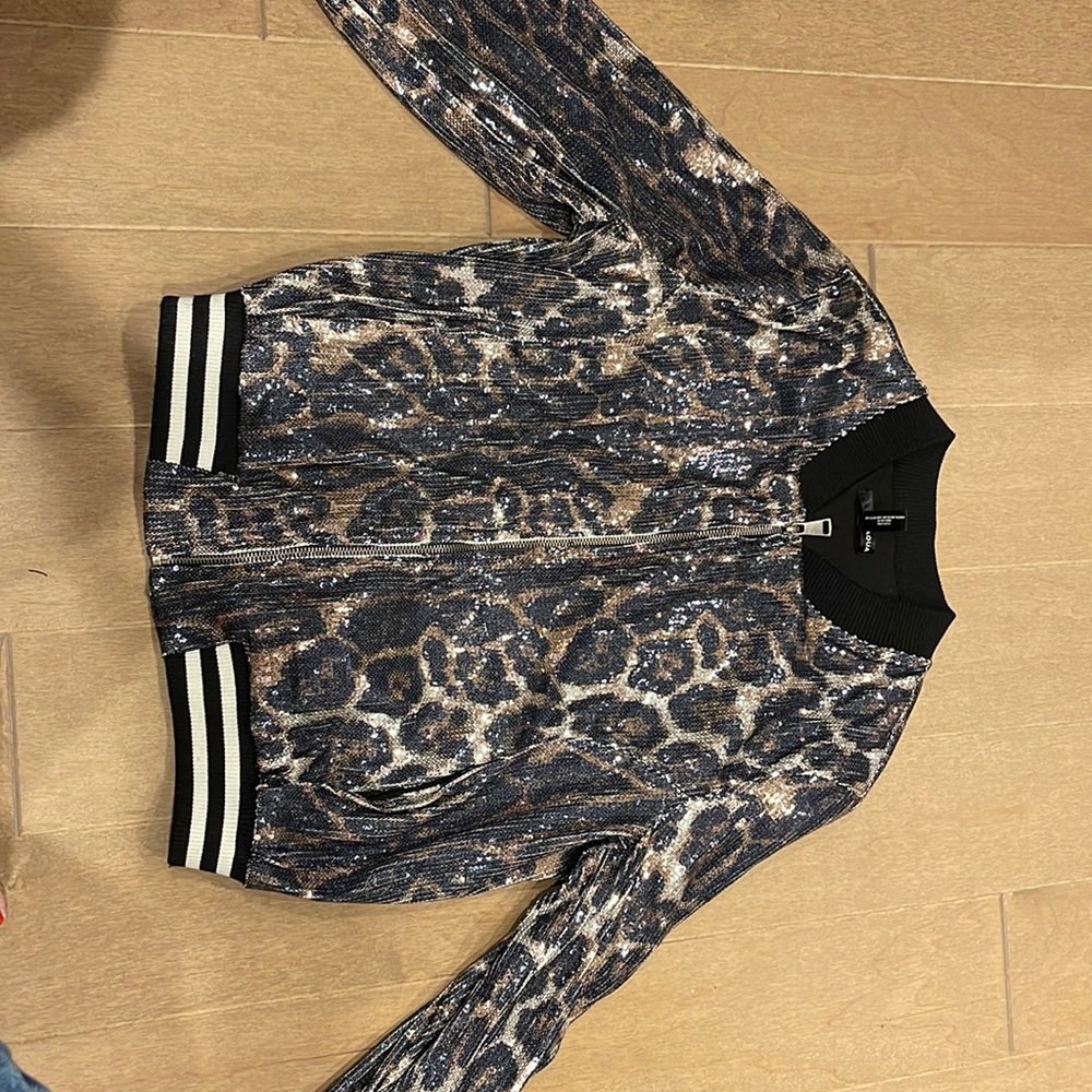 Aqua sequined leopard bomber jacket size small. Never worn no tags.